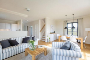 Reetland am Meer Premium Reetdachvilla mit 3 Schlafzimmern, Sauna und Kamin H11 in Dranske
